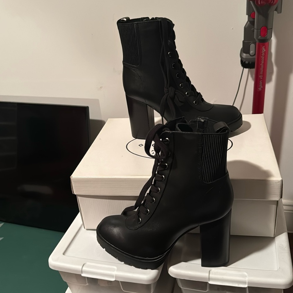 Steve Madden Latch black leather bootie. BRAND NEW, NEVER WORN